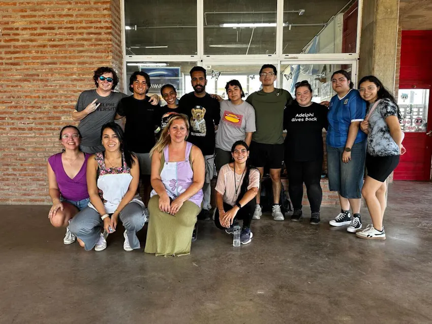 RA group of male and female Adelphi University students volunteering abroad with IVHQ in Buenos Aires, Argentina.