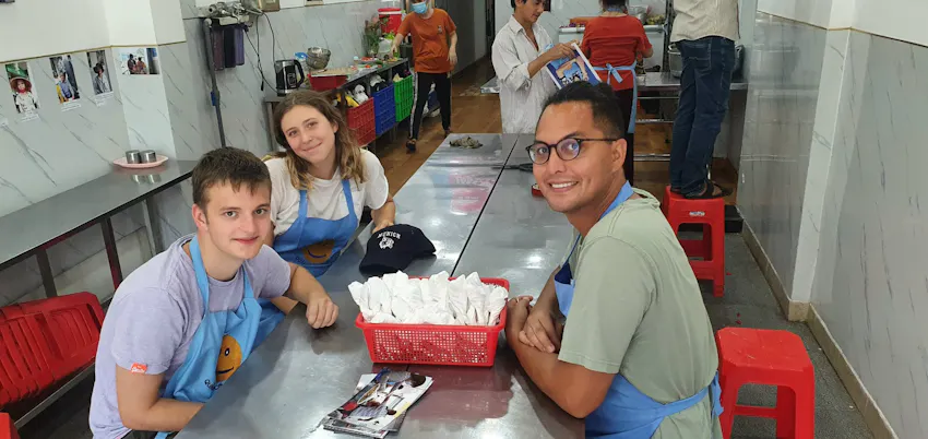 Students volunteering in the IVHQ soup kitchen project, welcomed and supported by the local team as part of the community.