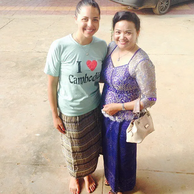 A volunteer host mother in Cambodia with IVHQ